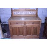A antique pine wash stand with tiled splashback, postage unavailable