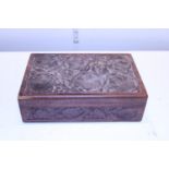 A hand carved wooden box