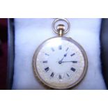 A ladies 18ct gold pocket watch finely engraved decoration to reverse and enamel dial with copper