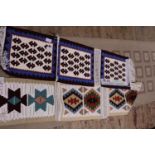 Two Persian hand woven table runners approximately 130cm x 28cm each