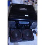 A Steepletone vintage style record deck and CD player with portable speakers. Shipping unavailable.