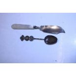 A Chinese hallmarked spoon and English hallmarked silver stilton knife