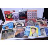 A job lot of assorted mixed vinyl records including Bill Hayley and Elvis Presley etc