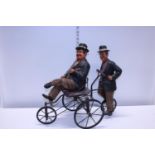 A vintage Laurel and Hardy themed figural group. Shipping unavailable.