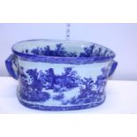 A antique blue and white ironstone footbath