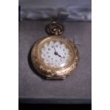 A beautiful ladies 14ct gold pocket watch very finely decorated with enamel to the reverse, very