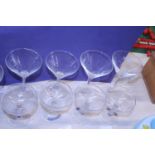 Four vintage Babycham glasses and other cocktail glasses