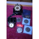 a job lot of assorted coinage including a £5 pound coin and two vintage time pieces