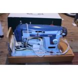 A vintage Ganome electric sewing machine (untested). postage unavailable.