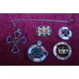 A selection of Scottish themed brooches etc