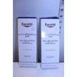 Two boxes of Eucerin skin products