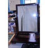 A antique mahogany dressing table mirror. postage unavailable.
