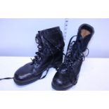 A pair of size 10 military issue boots