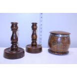 A wooden Tobacco jar and treen candlesticks