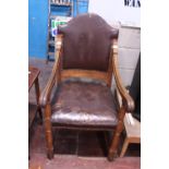 A large Victorian oak framed throne chair. postage unavailable.