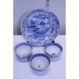 A selection of Chinese blue and white tea bowls and a larger bowl