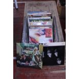 A selection of assorted LP records. postage unavailable.