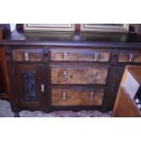 An Edwardian mahogany sideboard with Art Deco handles. postage unavailable.