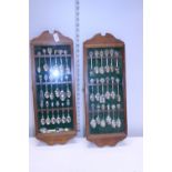 Two cased sets of collectors spoons