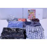 A job lot of assorted new scarves and other items