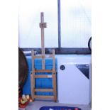 A table easel and a selection of new blank canvases. Shipping unavailable