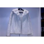 A ladies Astrika white fur jacket