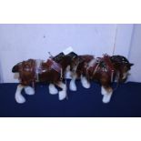 Two ceramic shire horses