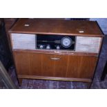A vintage music cabinet. postage unavailable. a/f