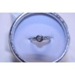 A 9ct white gold diamond solitaire ring size K 1/2