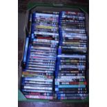 A box of assorted DVD's