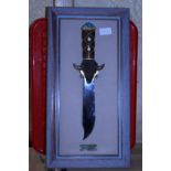 A Franklin Mint collectors knife on wall bracket entitled 'The Cheyenne buffalo knife'