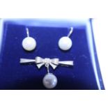 A 9ct gold antique pearl earrings and matching brooch set