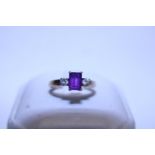 A 9ct gold amethyst and diamond ring