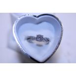 A 925 silver and white stone ring size O
