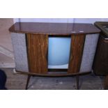 A vintage 1960's TV cabinet by Sobell, measures 98cm X 48cm X 84cm postage unavailable