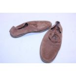 A new pair of Clarks shoes size 10