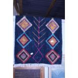 A retro woolen rug 70cm x 148cm