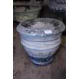 A stone planter on stand, postage unavailable