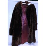 A ladies vintage brown fur coat