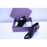A pair of ladies Carvela ankle boots size 38 (slight wear)