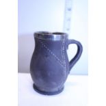A Royal Doulton jug with silver collar hallmarked for Chester
