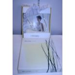 A boxed Belleek porcelain photo frame