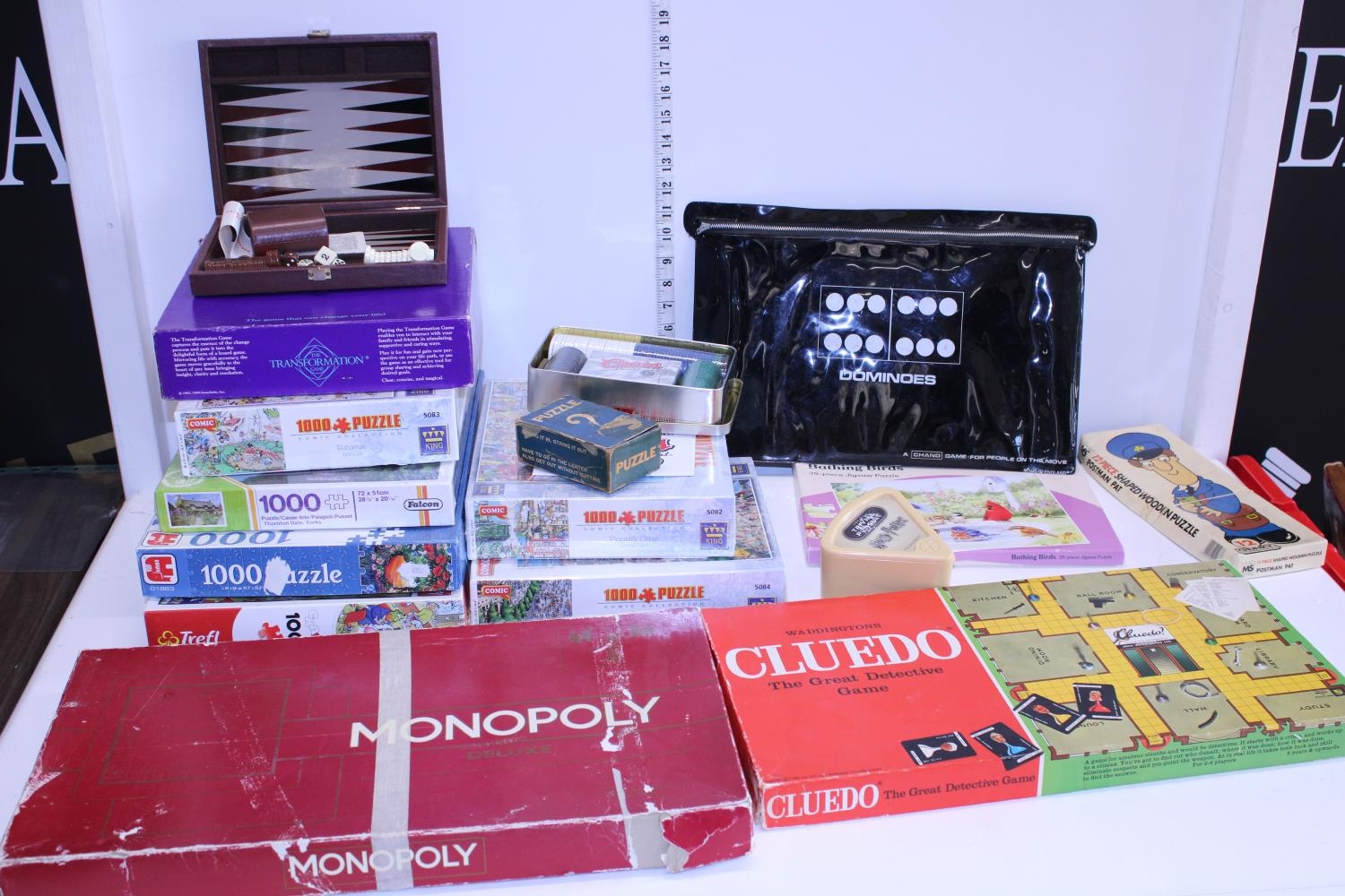 A large selection of vintage board games and jigsaws