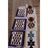 Two Persian hand woven table runners approximately 130cm x 28cm each