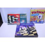 Three boxed board games (unchecked)