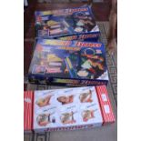 A boxed Jamonera and two boxed domino express games