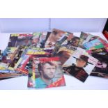 A large selection of vintage 1970 film review magazines and other