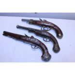 Three replica flintlock pistols