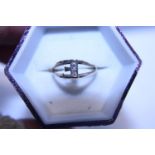 A 9ct gold and diamond letter E ring size L