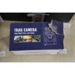 A boxed digital trail camera (untested)